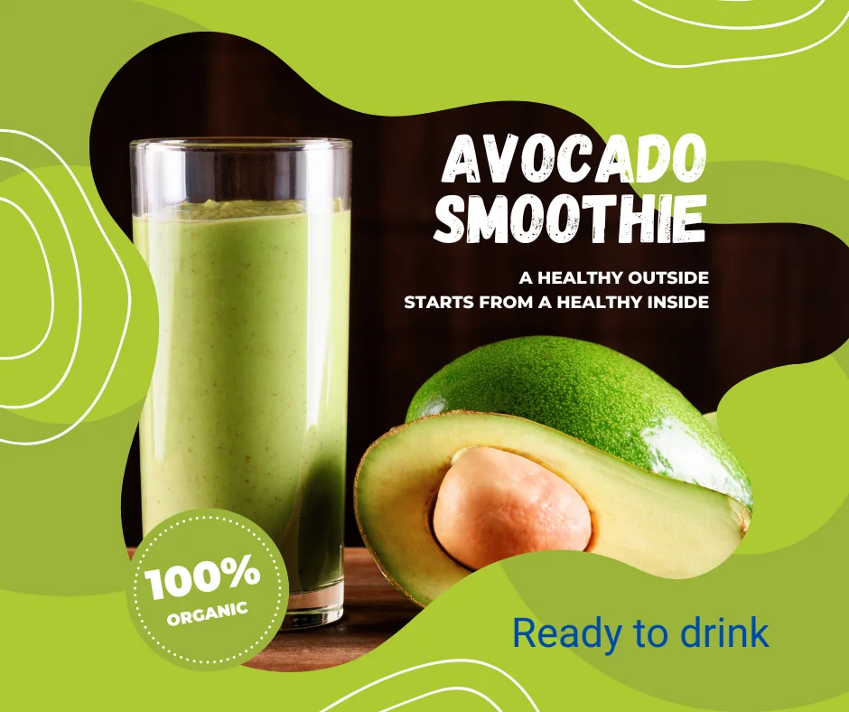 "Glass of creamy green acocado shake beside a fresh sliced avocado, promoting a healthy organic drink ready to enjoy."