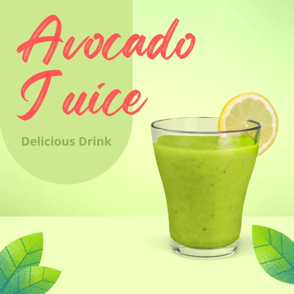 Fresh avocado juice in a glass with a lemon slice on the rim, healthy green drink with leaves in the background – avocado juice recipe and benefits